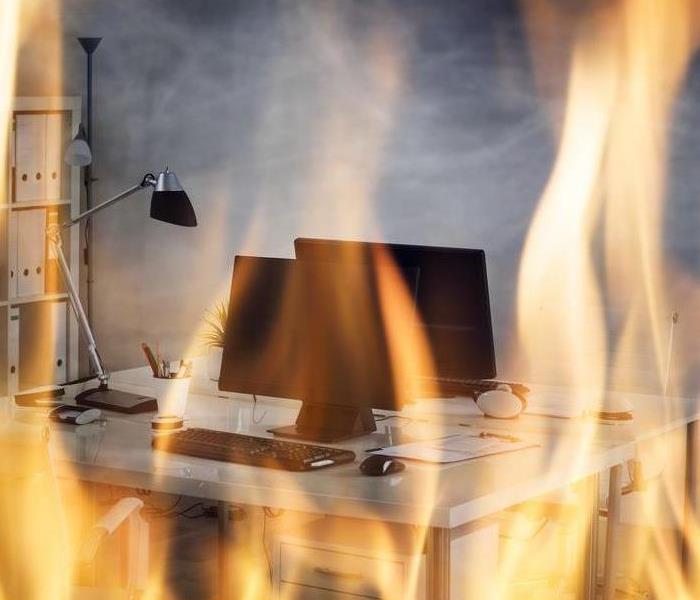 Computer and flames.