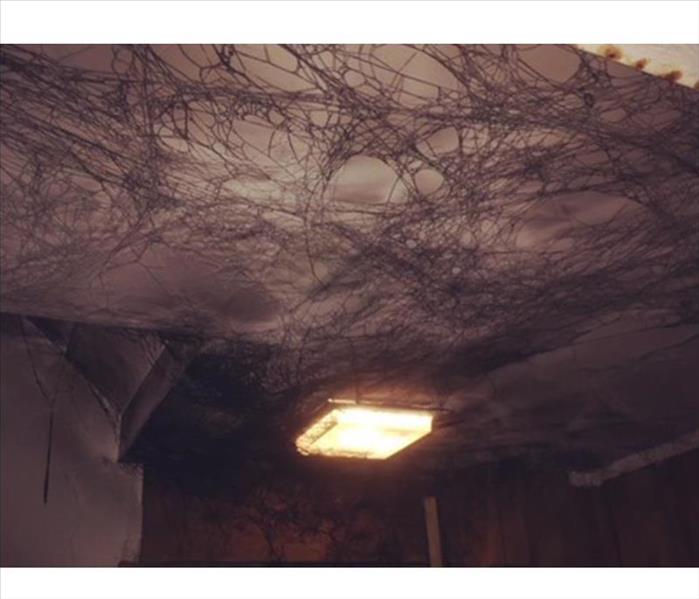 Ceiling covered with soot after puff back