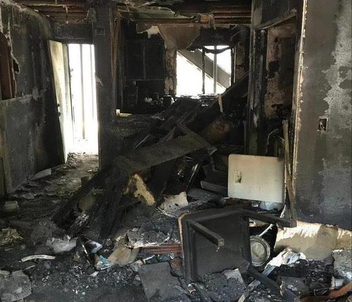severe furniture damaged by fire in a house